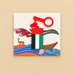 Load image into Gallery viewer, ميدالية علم الإمارات المستطيلة بسلسلة حمراء ليوم العلم مع البطاقة التراثية، تصوير علوي على خلفية بيج